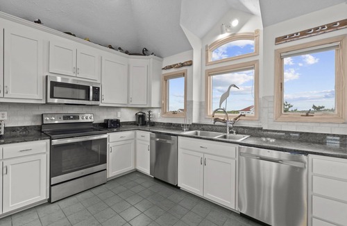 Pine Island House | Oceanfront house with private pool, hot tub, & rec room with pool table