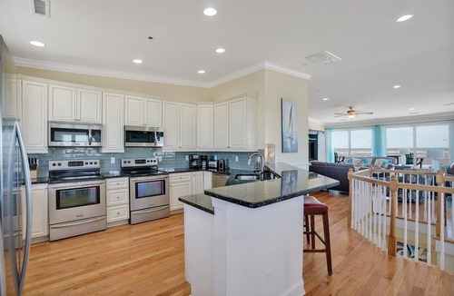 Oak Island House | Oceans 12: A luxurious 12-bedroom oceanfront retreat in Oak Island, NC.
