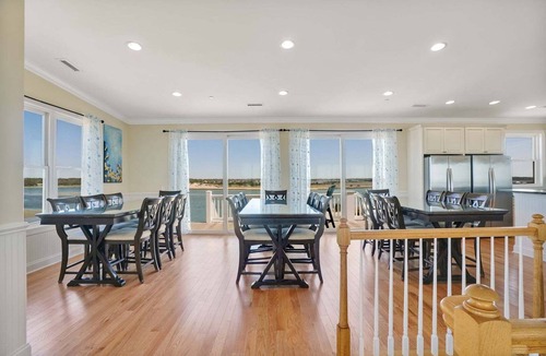 Oak Island House | Oceans 12: A luxurious 12-bedroom oceanfront retreat in Oak Island, NC.