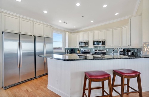 Oak Island House | Oceans 12: A luxurious 12-bedroom oceanfront retreat in Oak Island, NC.