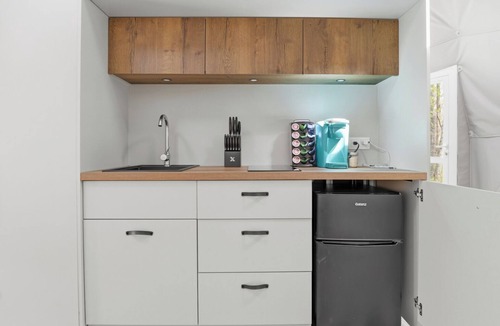 Mineral Apartment | One of kind wellness/glamping experience with wellness amenities, covered outdoor dining, a complete live fire cooking setup, and a clear star gazing top.