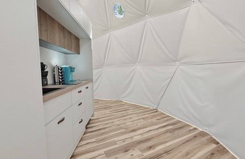 Mineral Apartment | One of kind wellness/glamping experience with wellness amenities, covered outdoor dining, a complete live fire cooking setup, and a clear star gazing top.