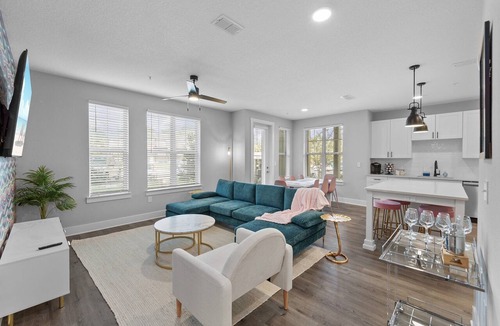 Deerwood Apartment | Palm Paradise: Tropical 2BR/2BA with Pool & Gym