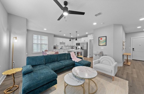 Deerwood Apartment | Palm Paradise: Tropical 2BR/2BA with Pool & Gym
