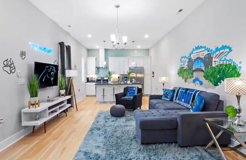 Third Ward House | PANTHERS THEMED 3-bedroom DUPLEX; 2 livings rooms & 2 kitchens, in uptown.