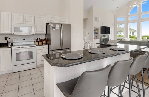 Pine Island House | Partial ocean-view home In Corolla with heated pool, hot tub, & rec room