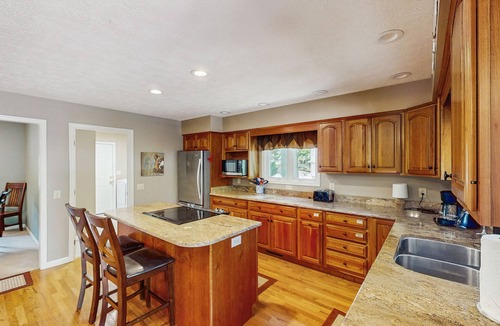 Huddleston House | Pawsitive Retreat - Pet Friendly home with enclosed yard, hot tub, 2 Kayaks, 2 SUPs & inflatables