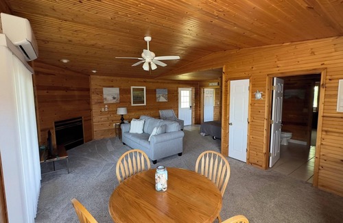 Alger Cabin | Peaceful Log Cabin Perfect for Cozy Couples' Retreat | Scenic Riverfront