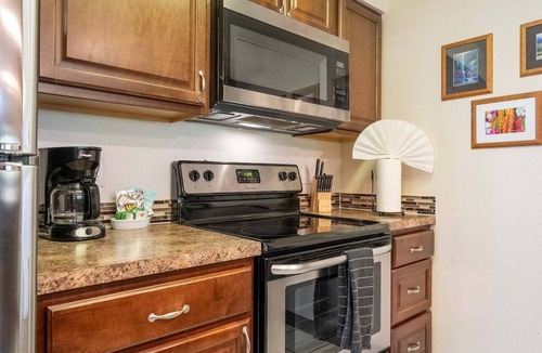 Kihei Condo | Perch - Maui condo: Pool, beach access, daily tranquility on lanai – an indulgent escape.
