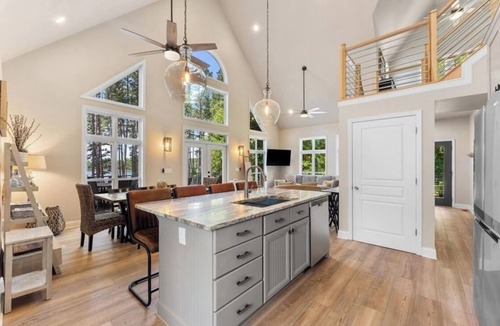 Reed Creek House | Perfect family lakeside getaway w/pickleball court. Slps 12, 2 docks, firepit