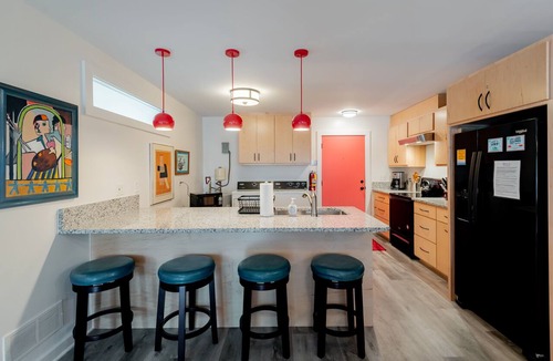 Folly Beach Apartment | Perfect Purple Palace Folly Vacation Apt A