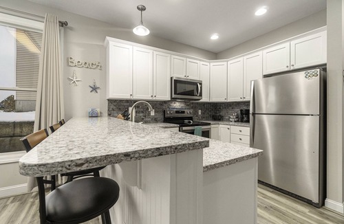 Manistee Condo | Pet Friendly Customized Harbor Village Condo