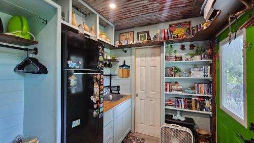 Liberty Hill Other | Pickles Place is a Stacked container home in the Texas Hill Country this space is surrounded by giant Elm trees lush greenery across the street from the San Gabriel river one double bed full size shower & full kitchen plus BBQ pit & flategrill