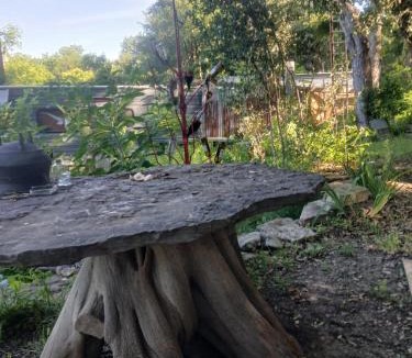 Liberty Hill Other | Pickles Place is a Stacked container home in the Texas Hill Country this space is surrounded by giant Elm trees lush greenery across the street from the San Gabriel river one double bed full size shower & full kitchen plus BBQ pit & flategrill