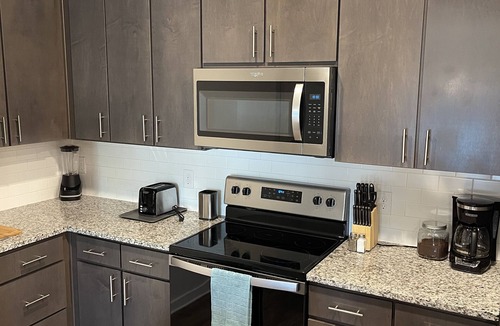 Deerwood Apartment | Poolside Oasis for All with Endless Amenities