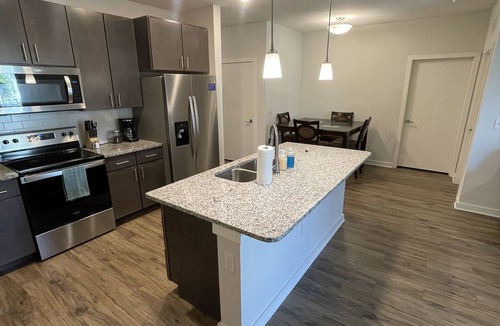 Deerwood Apartment | Poolside Oasis for All with Endless Amenities