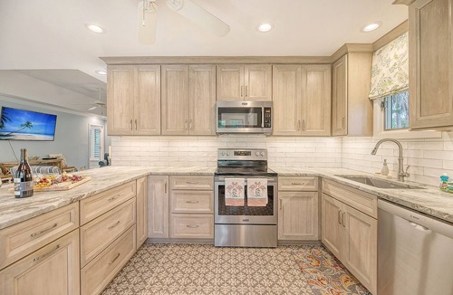 West Beach Cottage | Popular location, river view, pool access