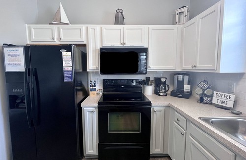 North Myrtle Beach Condo | Premier Golf Location - Barefoot Resort! Family/dog friendly - 2 pools/beach!
