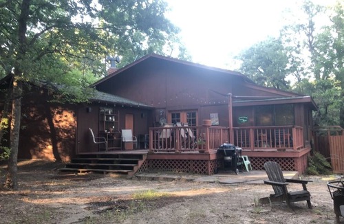 Hoyt Cabin | Private lakefront getaway with a sandy beach below the back deck!