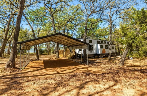 StarCrest Estates House | Private Lakeside RV Escape with Hot Tub, Multi-Level Deck, & Easy Water Access