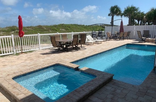 St. Augustine Beach House | Relaxed Cancellation Policy! Oceanfront home with pool,hot tub, fire pit, bikes.