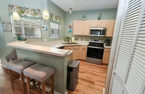 Holiday Isle Condo | Relaxing Destin Beach Walk Condo with Pool Views and Easy Beach Access Sandpiper Cove Unit 9201