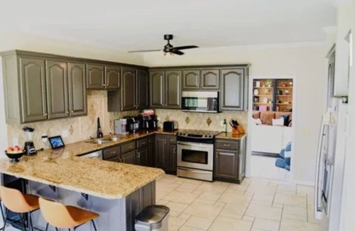Douglas House | Resort style 5-bedroom lake house with white sand beach, pool, and pool house.
