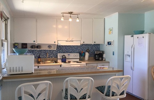 Topsail Beach Cottage | Retro Coastal Charm Meets Modern Comfort in Topsail Beach!