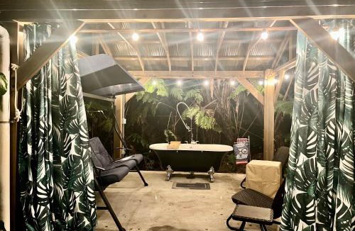 Ohia Estates House | Romantic Retreat, Relax at Hot-tub, Indoor & Outdoor shower, firepit, 5 min to Hawaii Volcano park