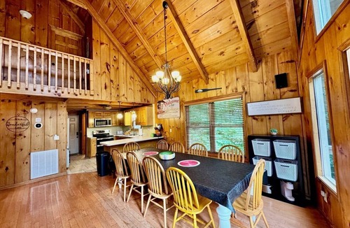 Flat Hollow Marina Cabin | Rustic Lakefront Cabin with private double-deck dock, slide, hot tub, more!