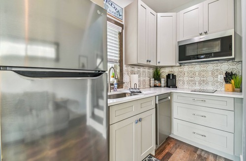 Dunedin House | Rustic Tiny Home on Pinellas Trail w/Heated Pool! Walk or Bike to Downtown Dunedin!