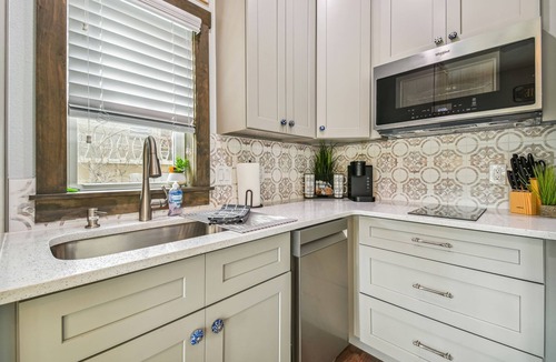 Dunedin House | Rustic Tiny Home on Pinellas Trail w/Heated Pool! Walk or Bike to Downtown Dunedin!