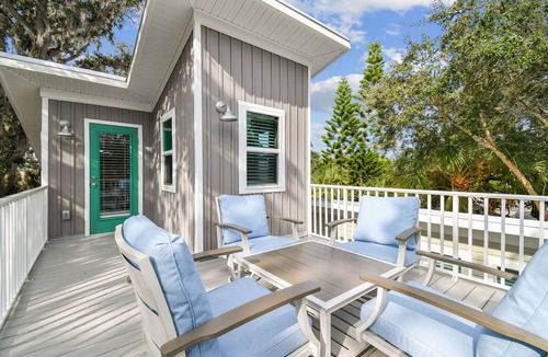 Dunedin House | Rustic Tiny Home on Pinellas Trail w/Heated Pool! Walk or Bike to Downtown Dunedin!
