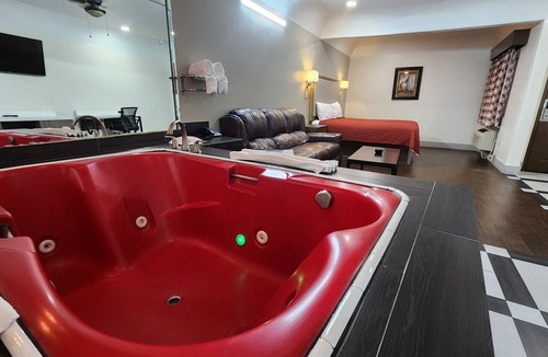 Clodine Hotel | Scottish Inns & Suites Sam Houston Pkwy