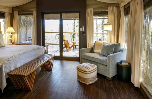 Zirconia Cabin | Secluded Glamping Tree Tent with Outdoor Soaking Tub & Private Pizza Oven Near Waterfalls, Zirconia, NC