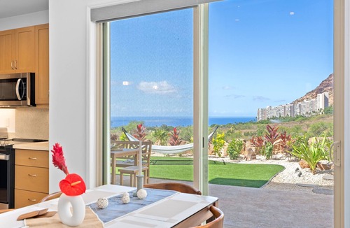 Makaha Valley House | Sleeps 16, 2 Homes | Ocean Views, Shared Pool + Gym, Near the Beach | AvantStay