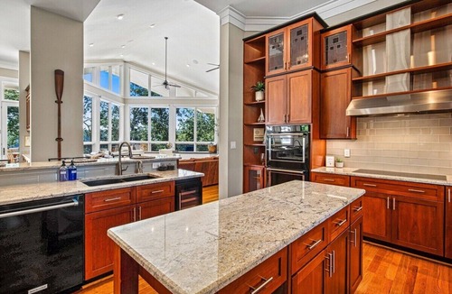 Barium Springs Villa | Sleeps 22 on Lake Norman, Island Retreat with Private Dock, Hot Tub, Game Rooms, Elevator, Full Bar, 2+ Acres of Lakefront Paradise, Fire Pit, Covered Dock, Kayaks, Perfect for Reunions, Corporate Retreats and Large Group Getaways