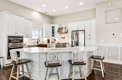 Nags Head House | Sound Living: Exquisite Canal-front home, Infinity Pool, Hot Tub, Elevator