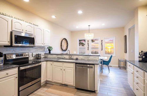 Corolla House | Soundfront Corolla Home with Hot Tub & Sunset Views!