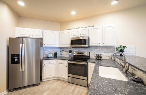 Corolla House | Soundfront Corolla Home with Hot Tub & Sunset Views!