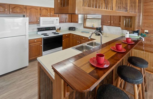 Salvo House | Soundfront Dog Friendly Home w/Hot Tub, Tiki Bar, Easy Windsports Access