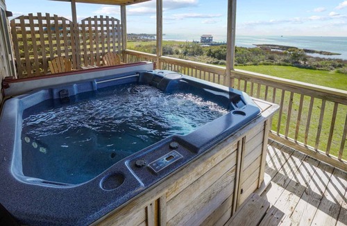 Salvo House | Soundfront Dog Friendly Home w/Hot Tub, Tiki Bar, Easy Windsports Access