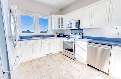 Buxton House | Soundfront Dog Friendly w/Hot Tub, Private Boat Slip, Easy Windsports Access