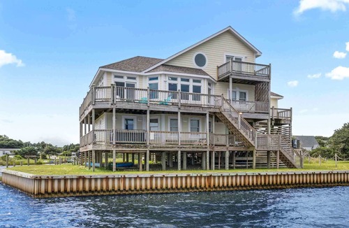 Buxton House | Soundfront Dog Friendly w/Hot Tub, Private Boat Slip, Easy Windsports Access