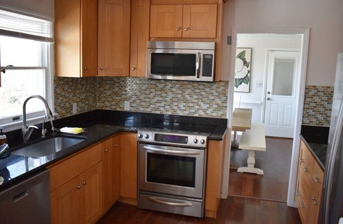 Kitty Hawk House | Soundfront sunsets, private dock, 4 king beds, screened porch, deck & bedrooms.