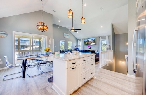 Avon House | Soundside Dog Friendly Home w/Hot Tub, Game Room, Tiki Bar, Screened Porch