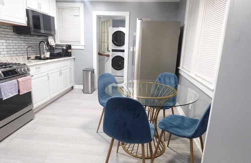 Lochearn House | Spacious 4 -Bedroom Home with 3 Baths Sleeps 8- 4 Full Beds