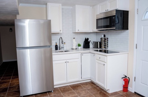 Friendly House | Spacious 5BR w/Private Fenced Backyard Near Nat'l Harbor, MGM & D.C.