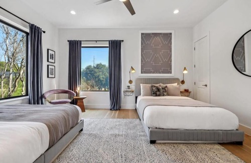 Govalle House | Spacious and Sleek Modern Elegance Heated Pool