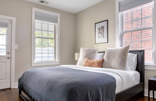 Truxton Circle House | Spacious NoMa 4BR w/ W/D & Backyard, nr Shops & Dining, by Blueground